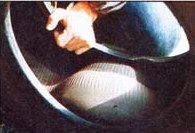 By simply pushing a tire down onto a rock, you can quickly expose its "innards" for inspection.